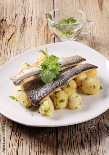 Pan fried trout fillets with potatoes