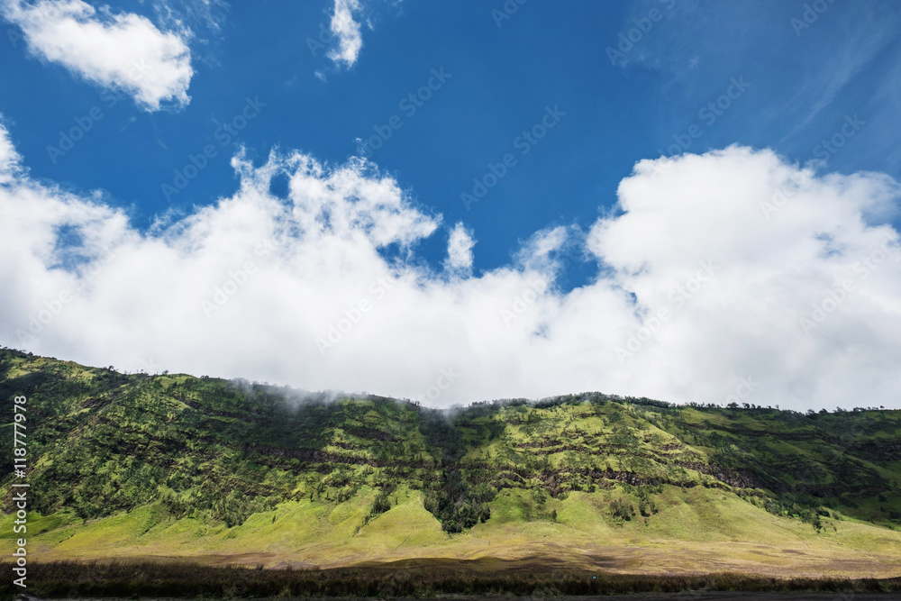 Green valley with prairie landscape with blue sky and clouds Green valley with prairie landscape with blue sky and clouds