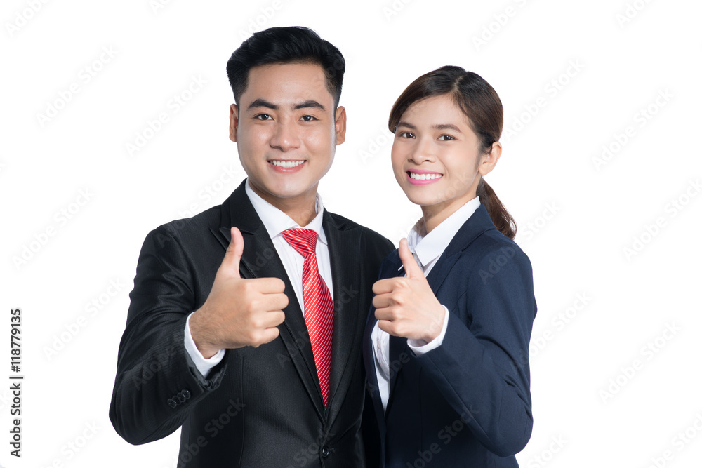 Successful business couple is standing on isolated background. Successful business couple is standing on isolated background.