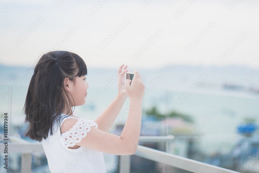 sian girl use smart phone taking photo sian girl use smart phone taking photo