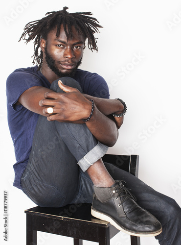 young handsome afro american man, angry look, weed junky isolated on white, problem teenage, depression greef photo