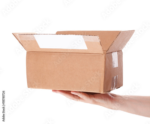 hand holding cardboard mail box isolated on a White background