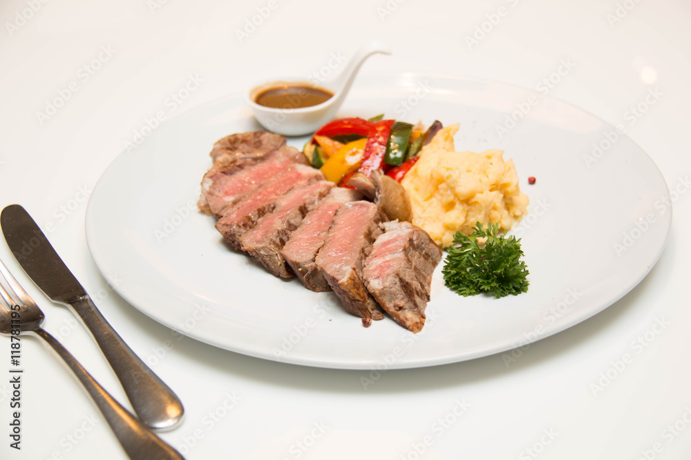 Beef steak with sauce as closeup