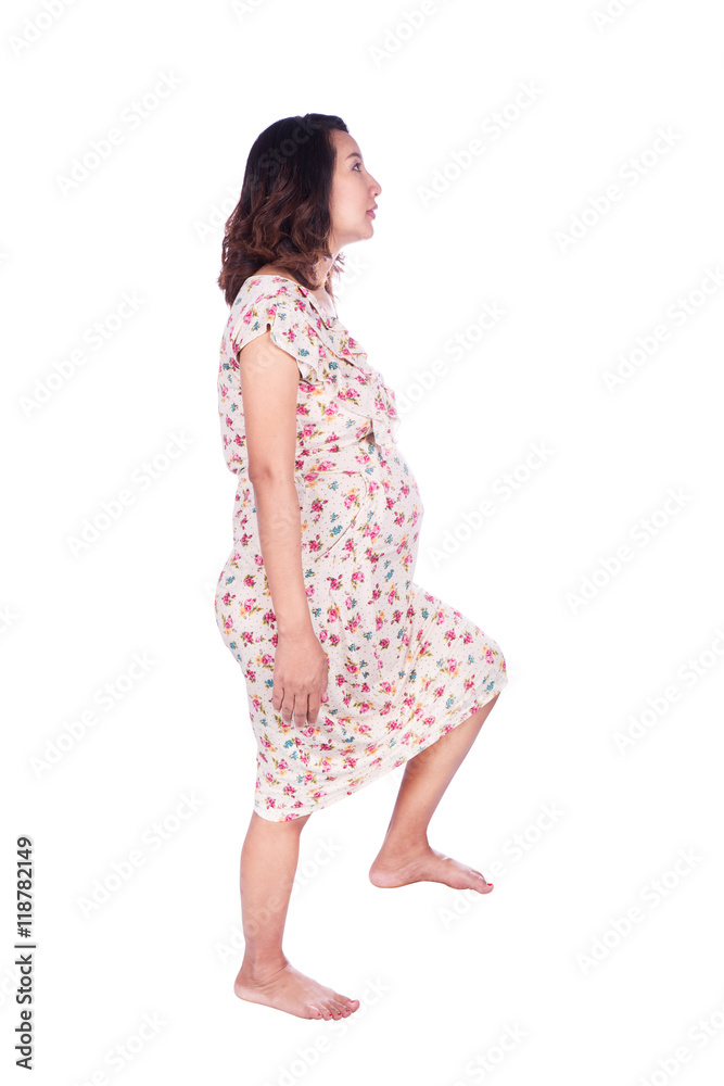pregnant woman stepping on imaginary step isolted on white