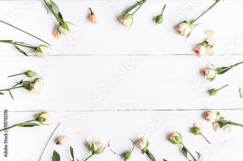 Fototapeta Naklejka Na Ścianę i Meble -  frame of rose flowers, top view, flat lay
