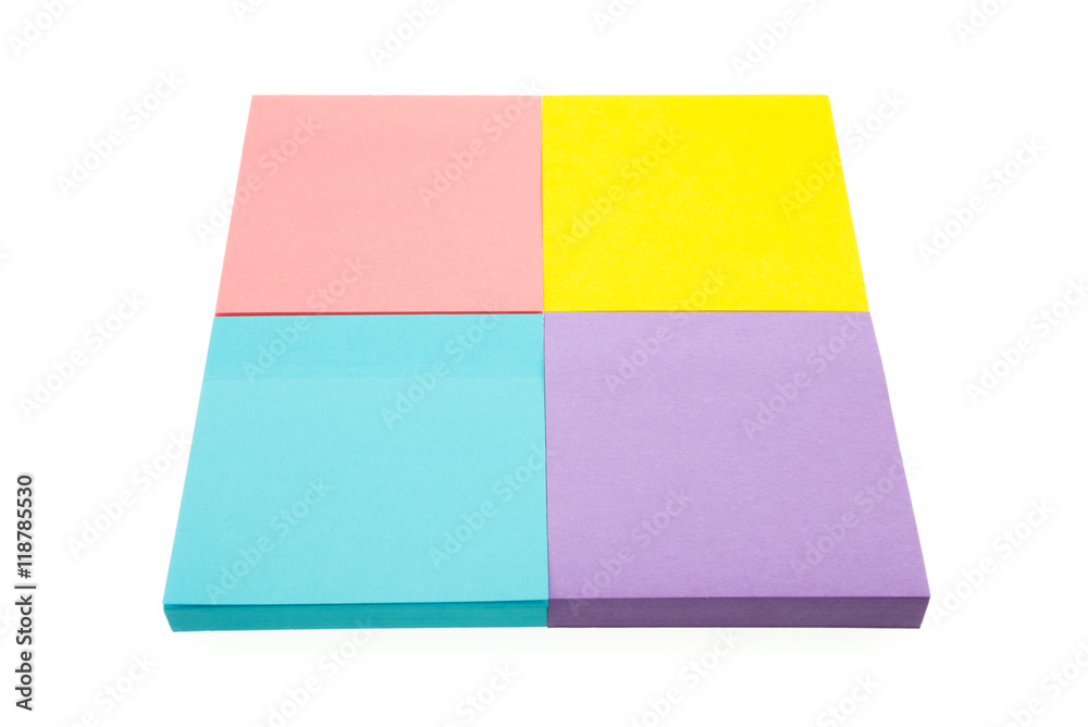 Four color block of paper notes isolated white background. Four color block of paper notes isolated white background.