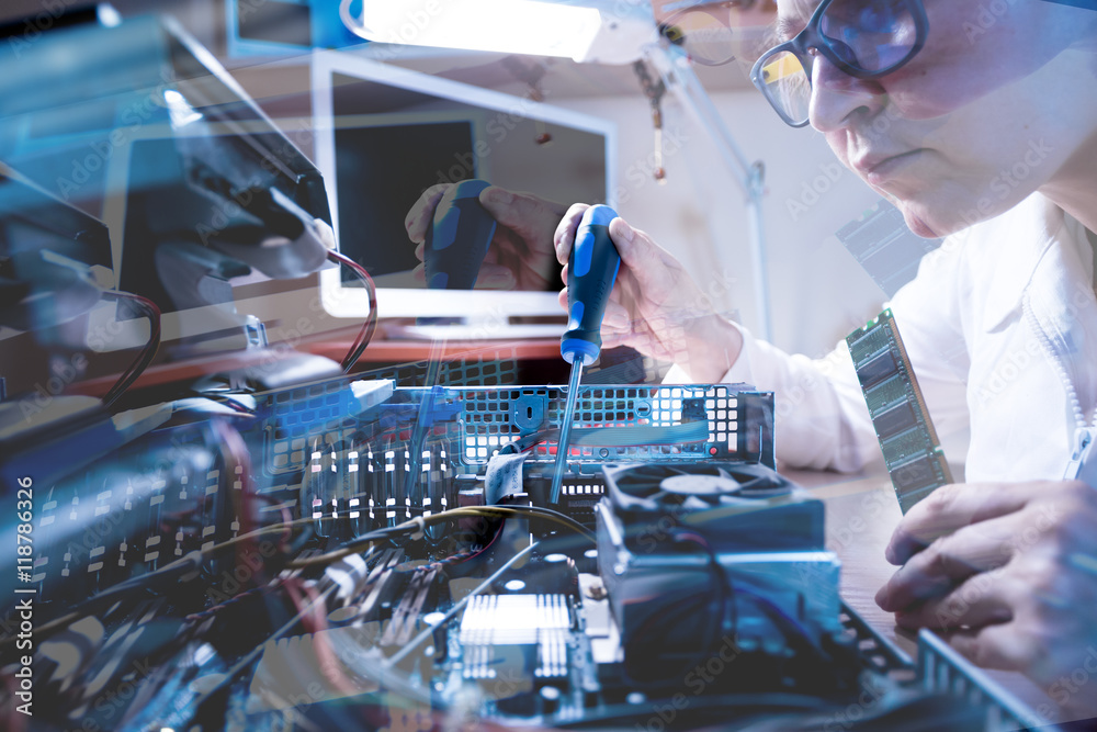 Computer Technician repairing Hardware throw the window image Computer Technician repairing Hardware throw the window image