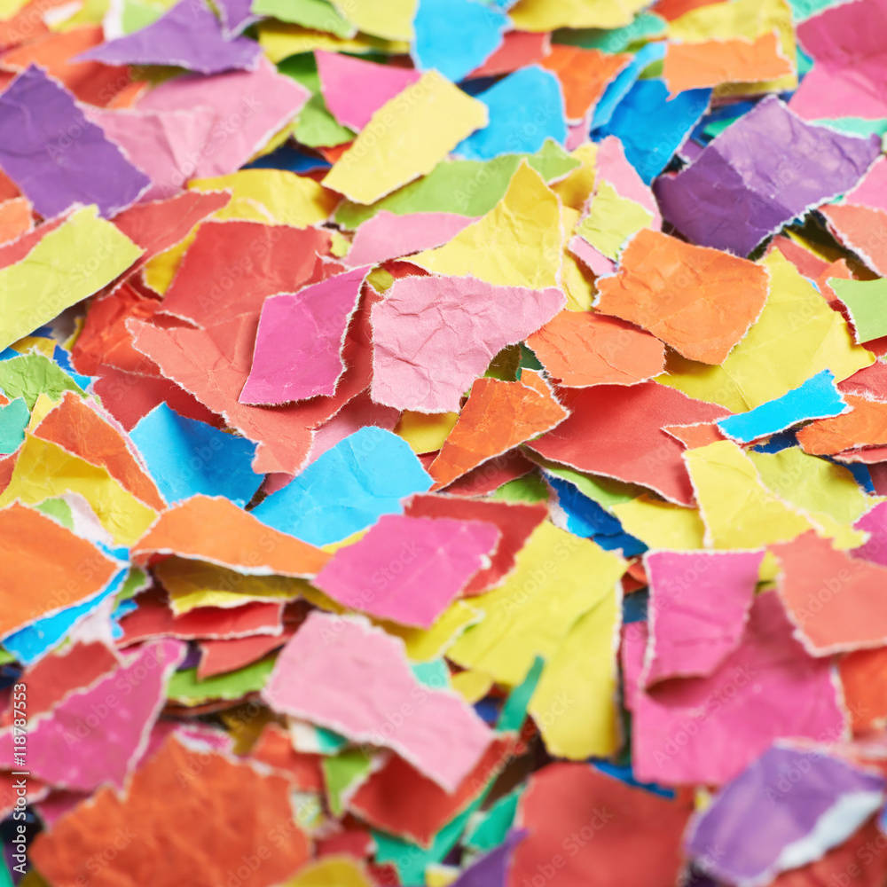 Surface covered with pieces of paper Surface covered with pieces of paper