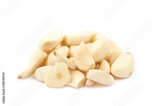 Pile of peeled garlic isolated