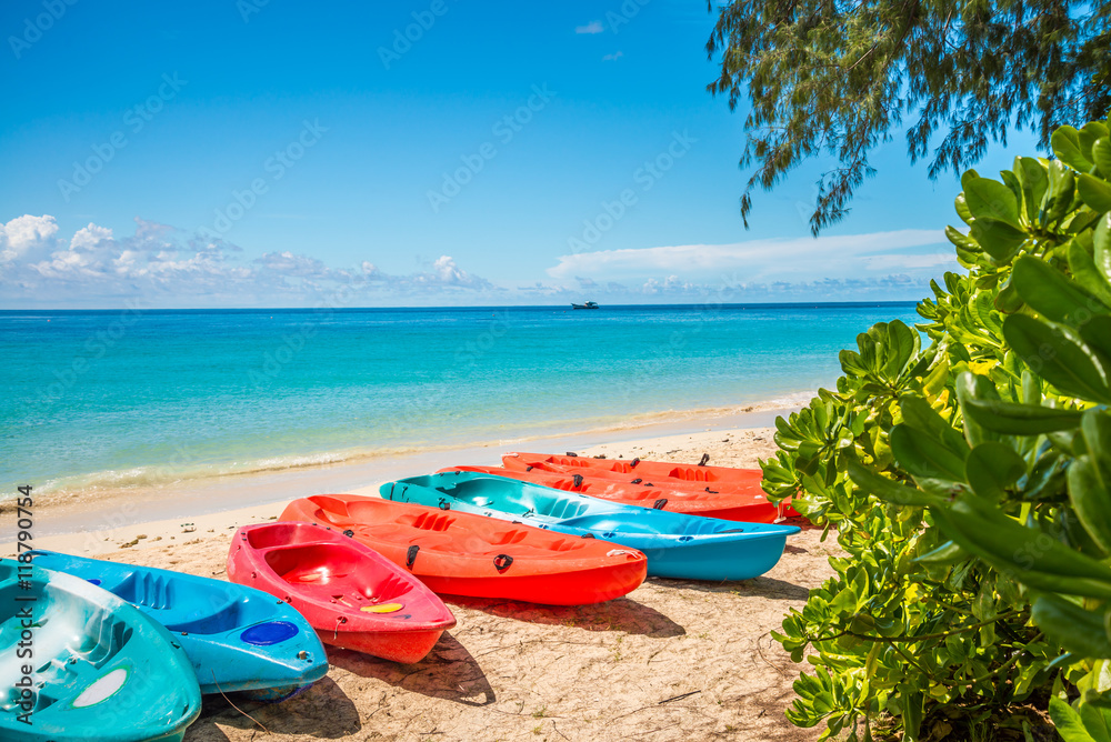 Canoe on beautiful tropical island white sand beach summer holiday - Travel summer vacation concept. Canoe on beautiful tropical island white sand beach summer holiday - Travel summer vacation concept.