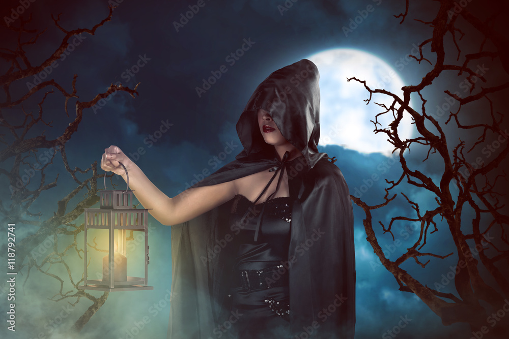 Asian witch woman holding lantern Asian witch woman holding lantern