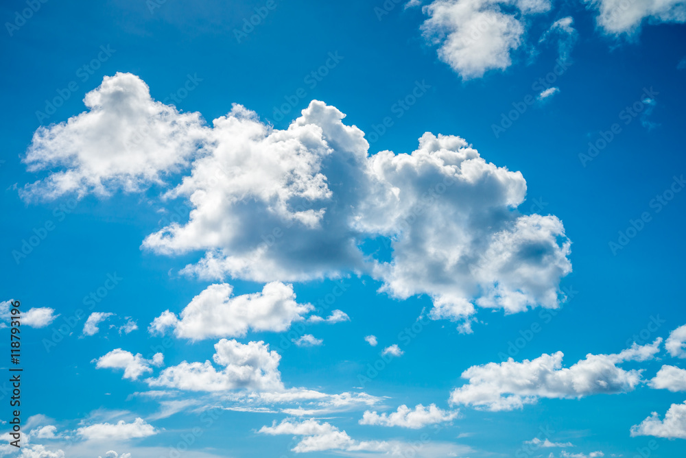Fototapeta premium White clouds and blue sky background in sunshine day - Save the earth concept.