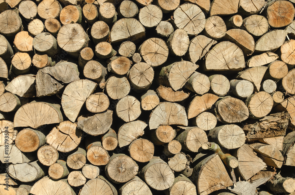 wooden logs stacked on one another
wooden logs stacked on one another