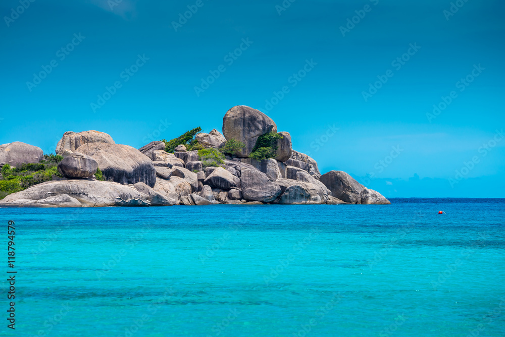 Beautiful tropical Similan island in sunny day blue sky background - Travel summer beach holiday concept.
