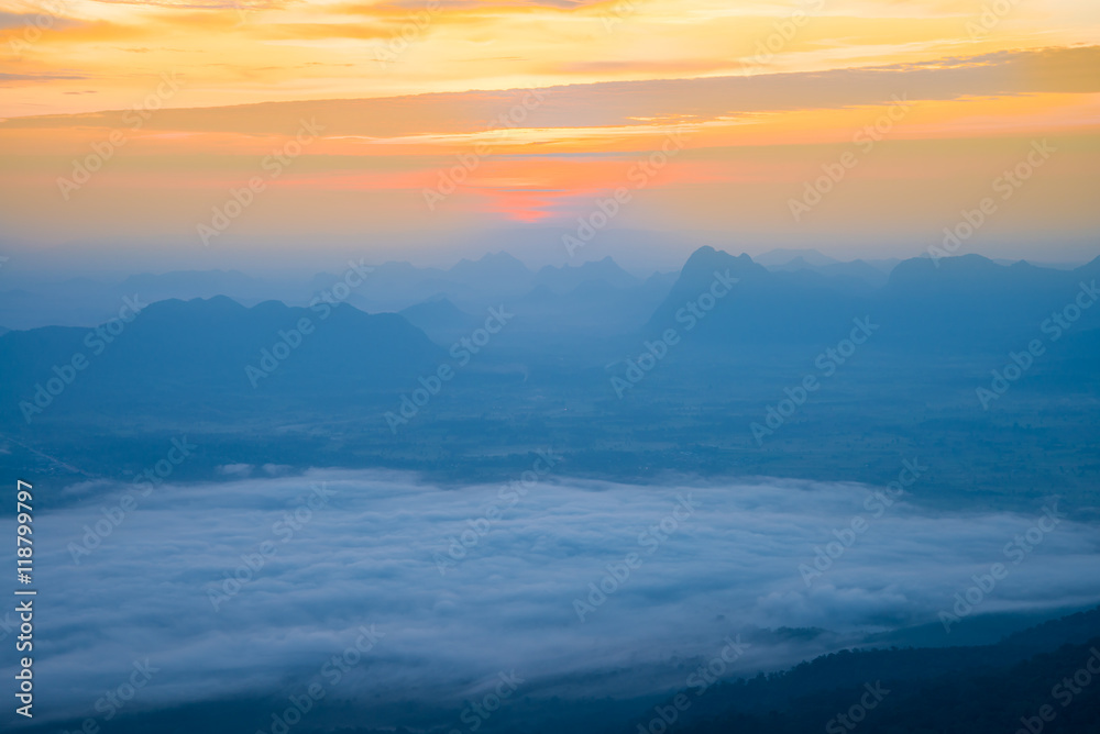 Dawn over mountain from viewpoint on the top of mountain. Nature traveling concept.