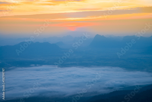 Dawn over mountain from viewpoint on the top of mountain. Nature traveling concept.