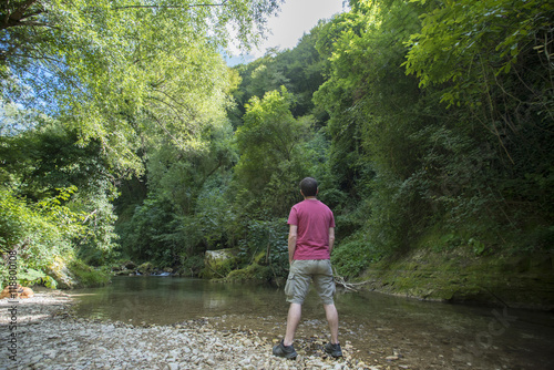 Man on the river, trekking, mountain