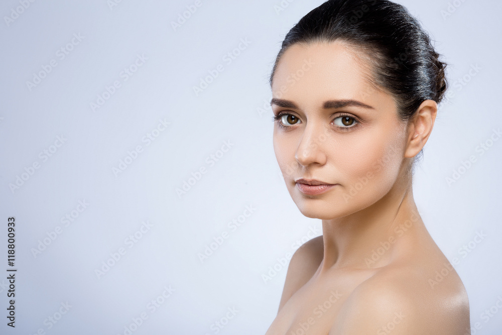 Beautiful girl with nude make up at studio Beautiful girl with nude make up at studio