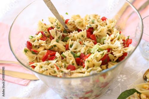 pasta salad with chopped pepperes and herbs