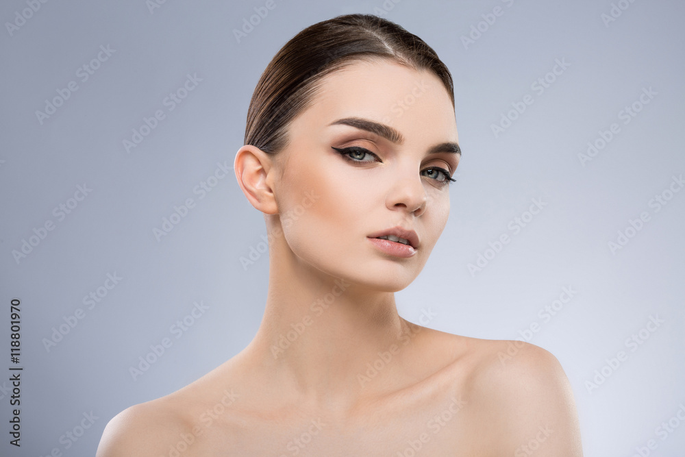 Beautiful girl with nude make up at studio Beautiful girl with nude make up at studio