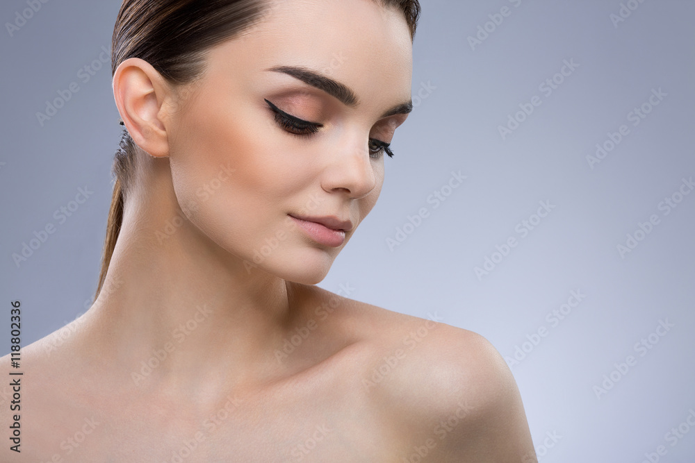 Beautiful girl with nude make up at studio Beautiful girl with nude make up at studio