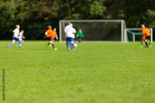 Blurred youth soccer players © Mikkel Bigandt