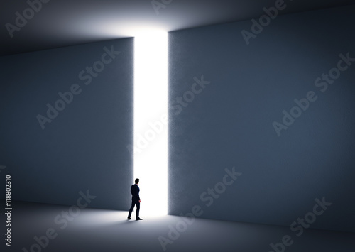 Businessman about to cross the entrance to the light. photo