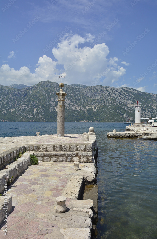 The Our Lady of the Rock island in Kotor Bay, Montenegro. The island was artificially created and includes a small Roman Catholic church. 
