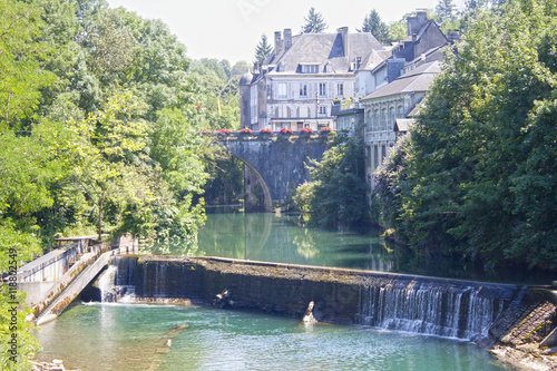 Lake with a waterfall in Oloron Saint Marie, France