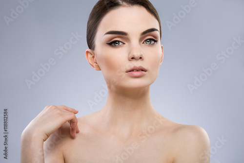 Beautiful girl with nude make up at studio
