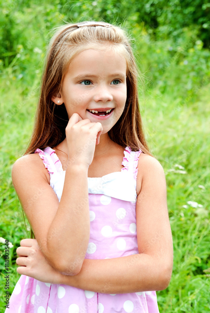 Portrait of adorable smiling little girl in summer day Portrait of adorable smiling little girl in summer day