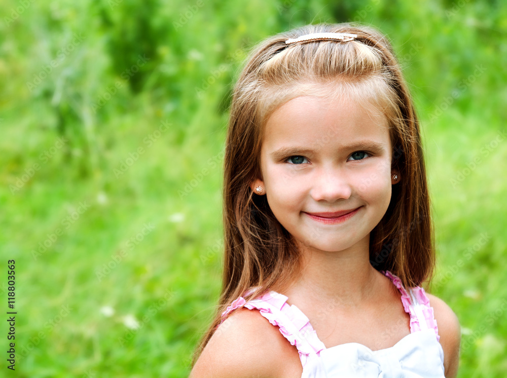 Portrait of adorable smiling little girl in summer day Portrait of adorable smiling little girl in summer day