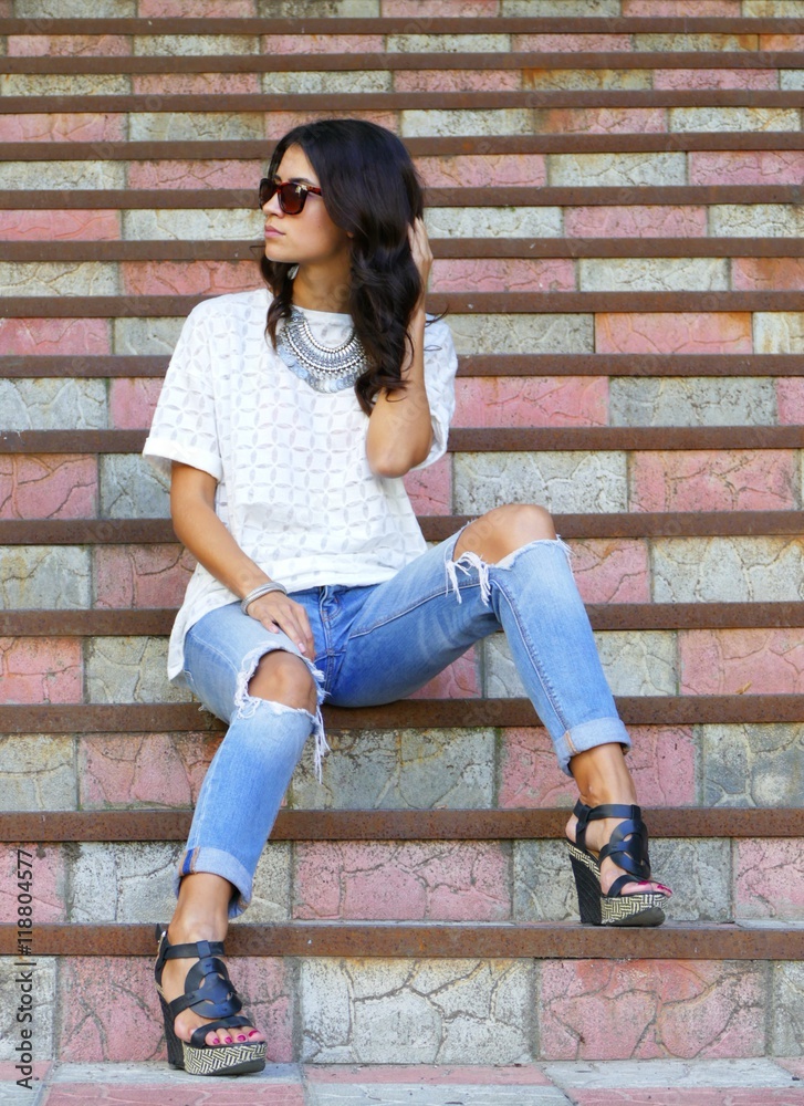 beautiful model posing on a stairs beautiful model posing on a stairs