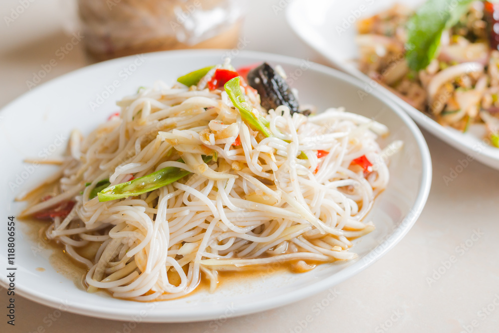 Close up Papaya Salad with Vermicelli, Salted Crab and Fermented Close up Papaya Salad with Vermicelli, Salted Crab and Fermented