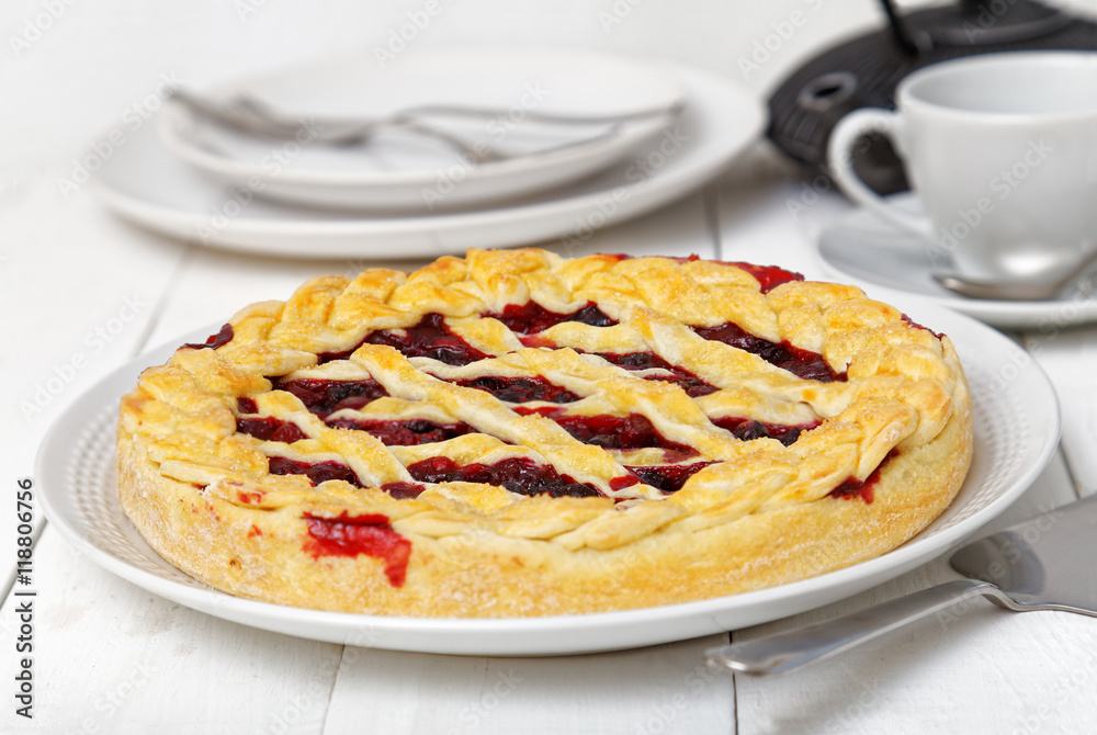 Homemade berry pie with cherries and raspberries