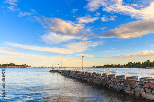 Sea pier landscape, old wooden pier and blue sky © daliu