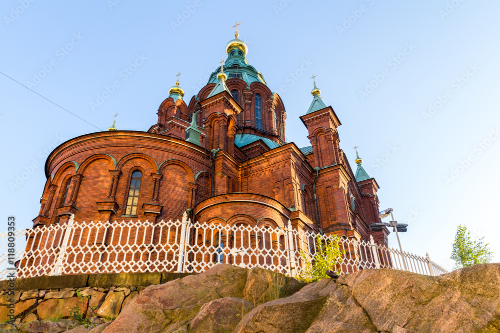 Fototapeta premium Evening scenery of Uspenski Orthodox Cathedral Church in Katajanokka district of the Old Town in Helsinki, Finland