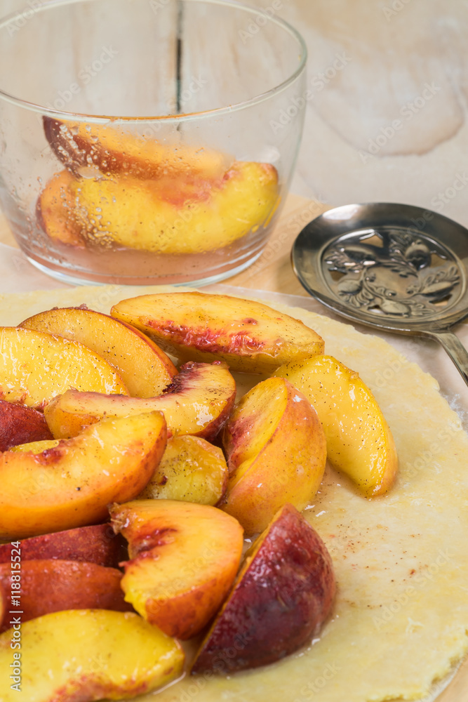 Spiced peach filling on rolled out dough. Spiced peach filling on rolled out dough.