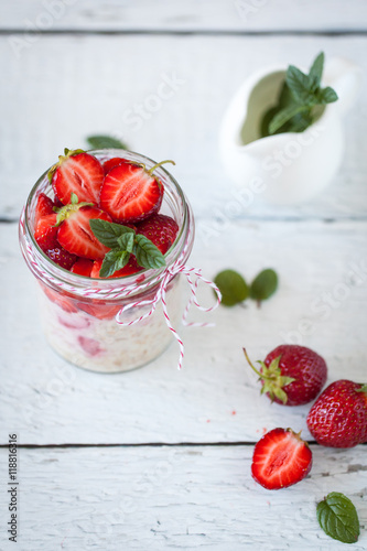 Healthy breakfast: overnight oats with fresh strawberries