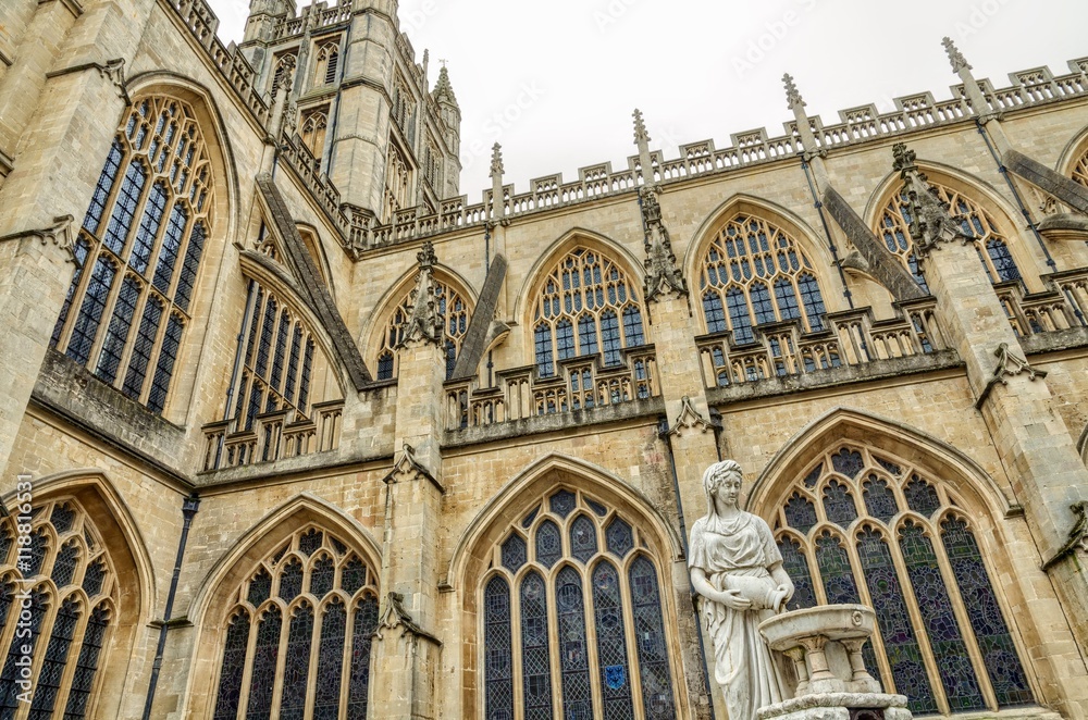 Statue and exterior of Bath Abbey,, England