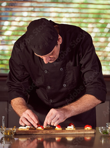 Restaurant hotel private chef preparing making canapes starters