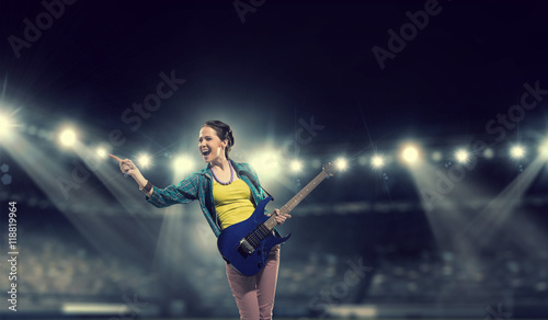 Female rock guitarist . Mixed media © Sergey Nivens