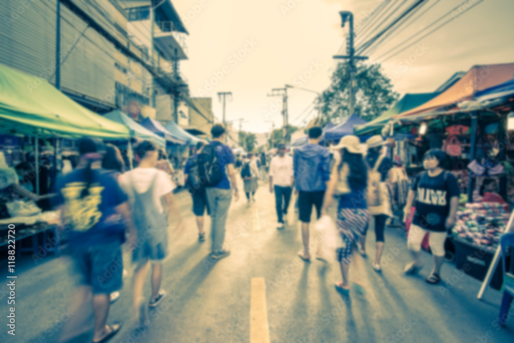 Obraz premium Blurred image of street market with retro color effected, blurre