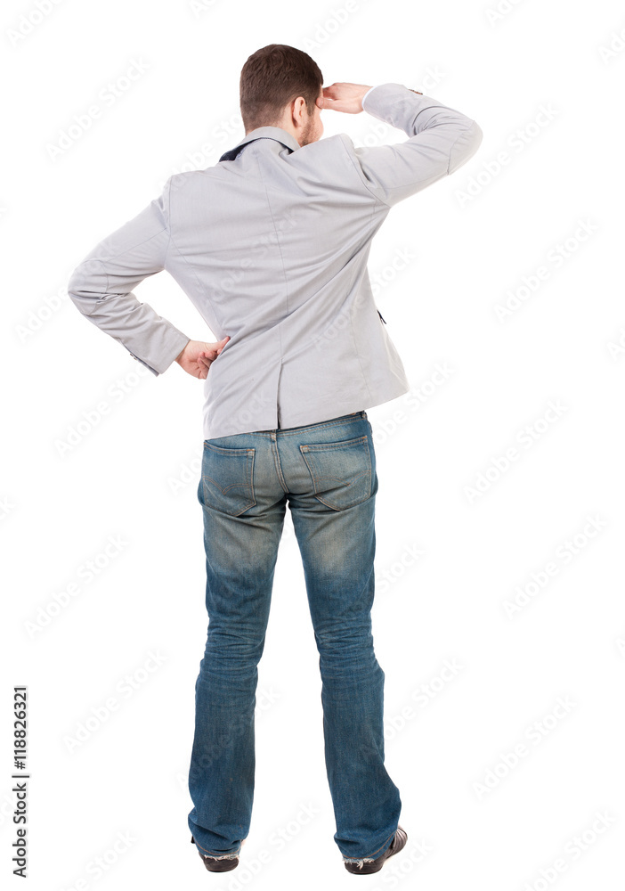 back view of Business man looks. Rear view people collection. backside view of person. Isolated over white background.A guy in a gray jacket looks afar having put his hand to his eyes. back view of Business man looks. Rear view people collection. backside view of person. Isolated over white background.A guy in a gray jacket looks afar having put his hand to his eyes.