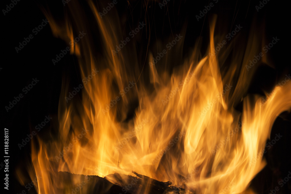 Embers charred in a flame of fire, abstract background