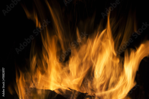 Embers charred in a flame of fire, abstract background