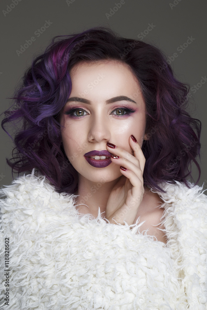 Portrait of beautiful fashion model with violet hair