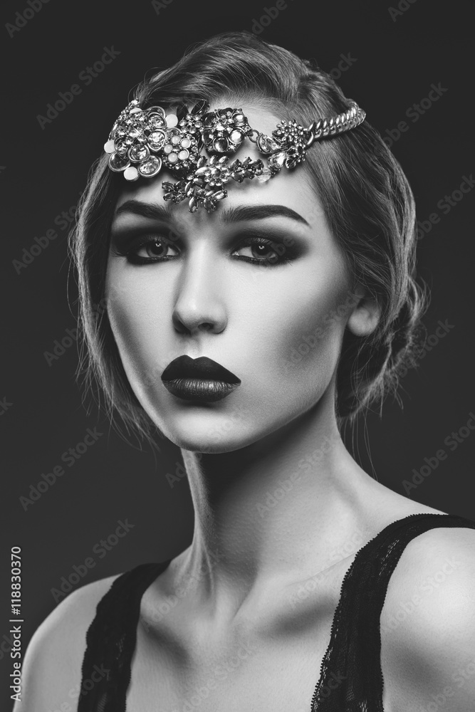 Fototapeta premium Beautiful girl with smoky eyes and red lips