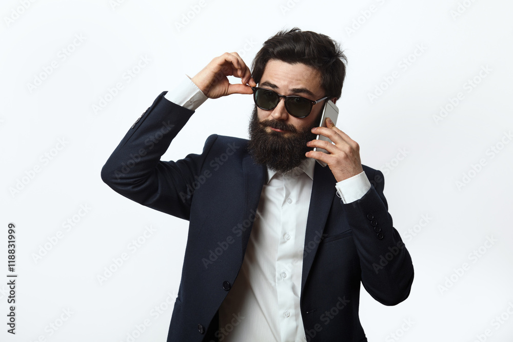 Business man talking on the phone. Business man talking on the phone.