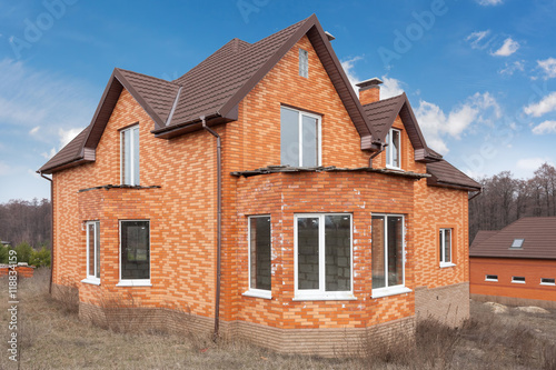 Beautiful new brick hoouse with plastic windows and metal tiler roof